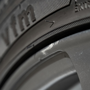 close-up of a tire showing details like tread and sidewall markings high performance tire close-up tire specifications